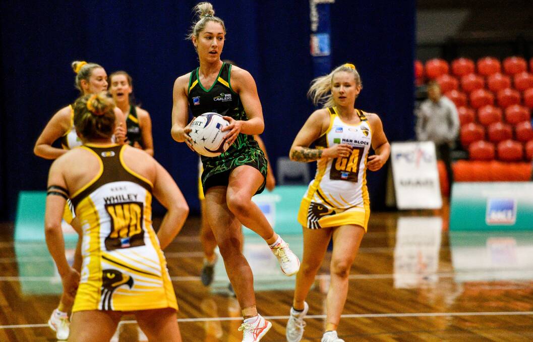 STANDOUT: Cavaliers midcourter Shelby Miller jumps to attention during last season's winning grand final against Northern Hawks at the Silverdome. Picture: Scott Gelston