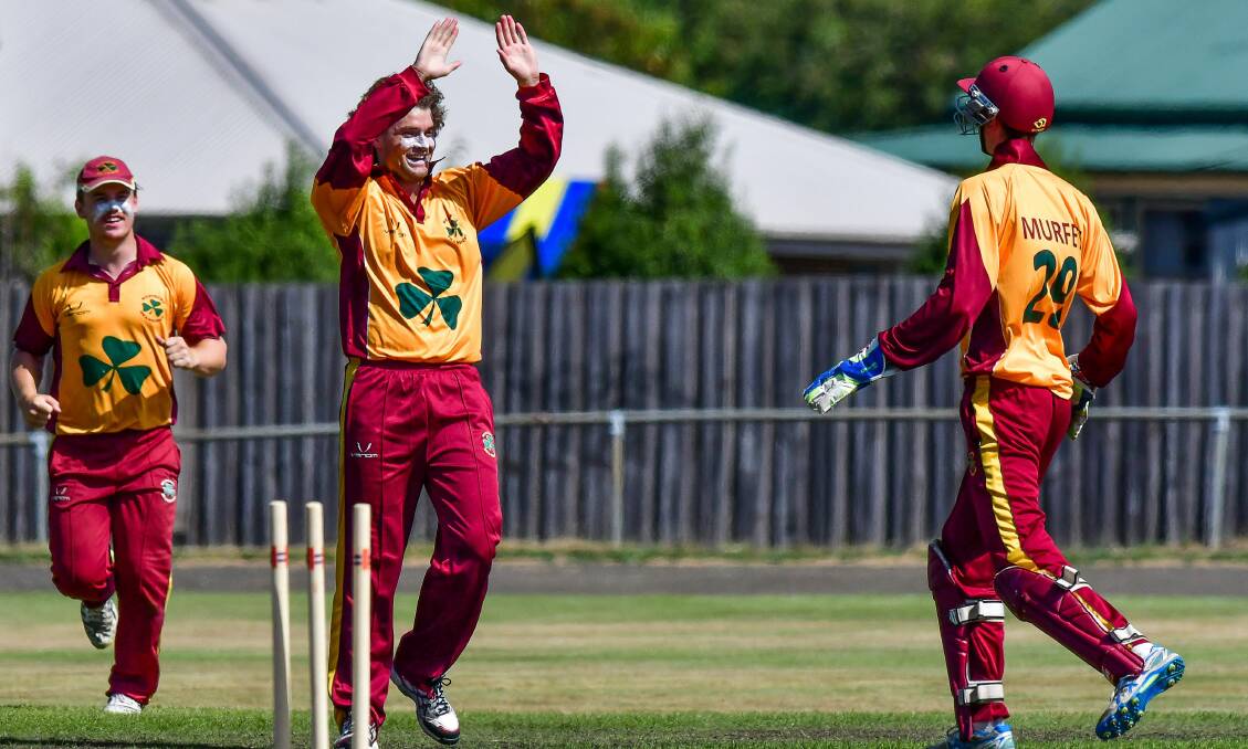 HANDS UP: Westbury wicketkeeper Daniel Murfet joins wicket-taker Will Donald in celebration at the Greater Northern Cup final. Pictures: Scott Gelston