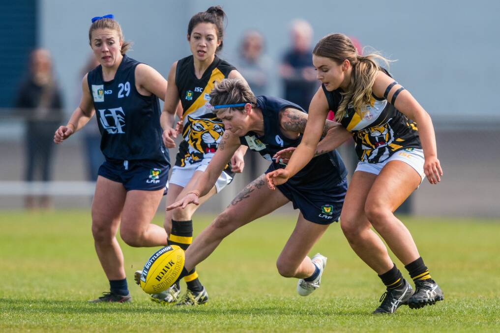 TIGER HUNT: Launceston campaigner Chanette Thuringer leads the chasers to the ball in last Sunday's semi-final against Tigers. Picture: Phillip Biggs