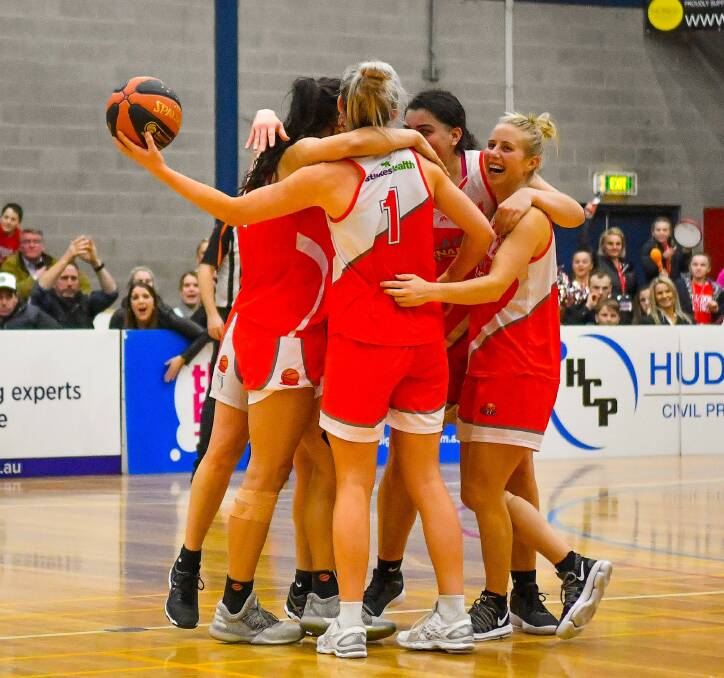 BACK WHEN: Launceston Tornadoes celebrate their preliminary final win over Nunawading earlier this year when WNBL recruits were all teammates.