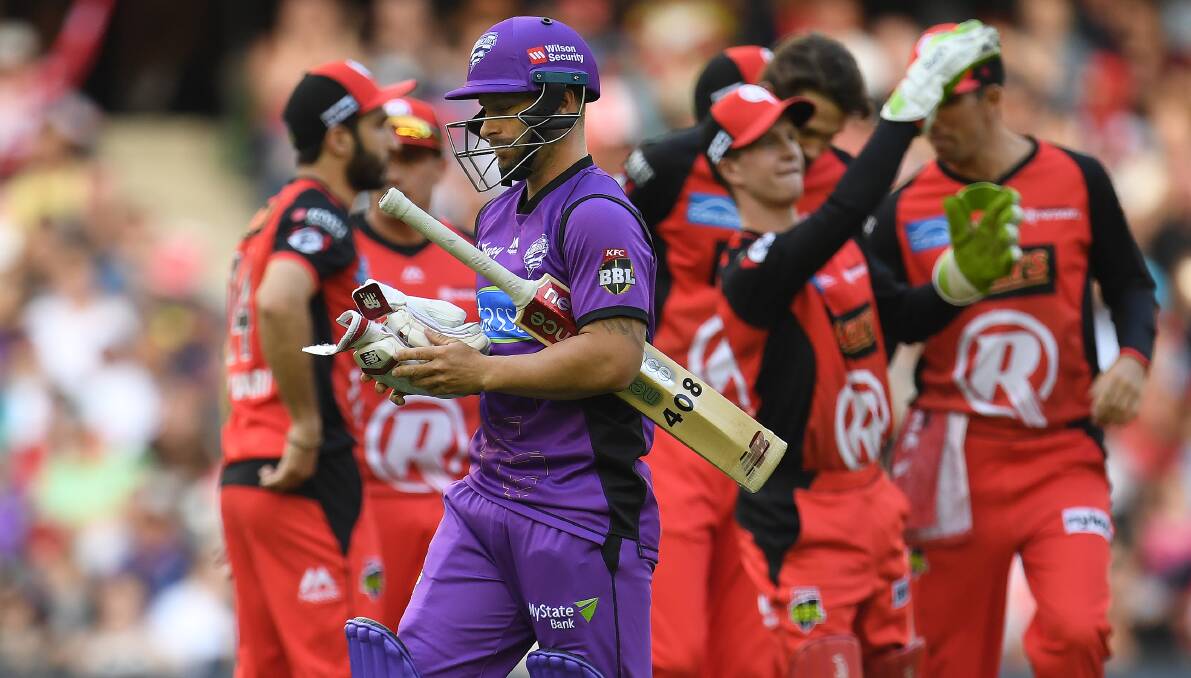 GONE: Hobart Hurricanes captain Matthew Wade walks away from the pitch after being dismissed cheaply against the Renegades on Monday night in Melbourne. Picture: AAP