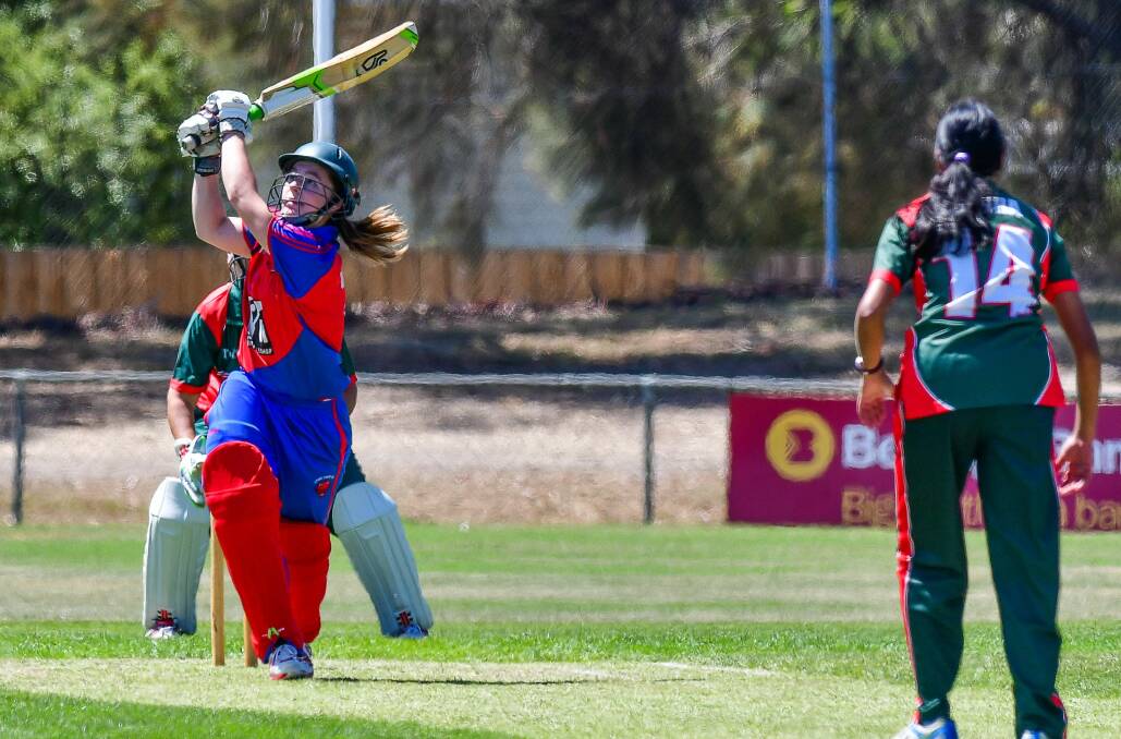 HIGH AND HOPE: Latrobe batter Bronte Irvine swings hard against Launceston in the clash at Youngtown on Sunday. Picture: Scott Gelston.