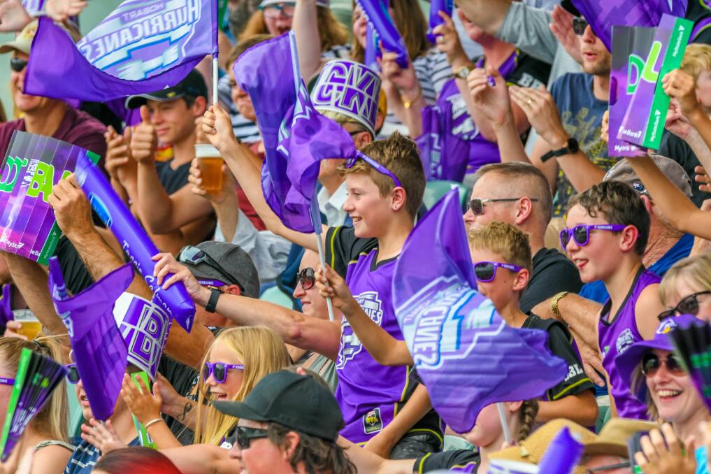 PURPLE WAVE: The Hobart Hurricanes fans that turned up on a muggy Launceston day at UTAS Stadium enjoyed an entertaining game that included 362 runs. Picture: Phillip Biggs