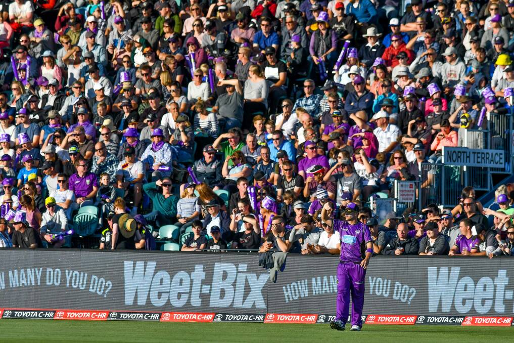 BIG TURNOUT: Hobart Hurricanes spinner Cameron Boyce stands in front of a packed Launceston crowd last year in the BBL clash with Sydney Thunder. Picture: Scott Gelston