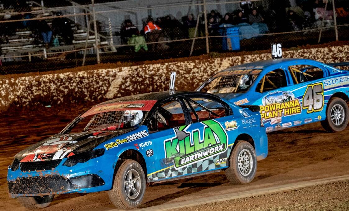 WILD RIDE: Modified driver Craig Williams leads on his way to winning the Derrick Dunne Memorial on Saturday night. Picture: Angryman Photography