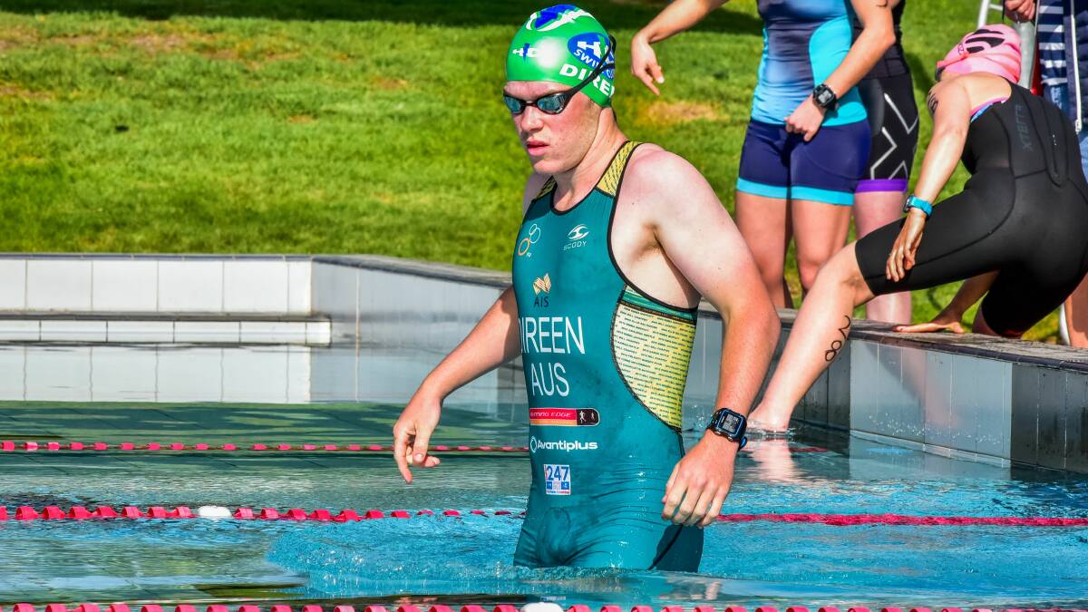 COOL CHANGE: Hobart's Jack Direen takes a gingerly step in the pool before missing the win in the George Town triathlon.