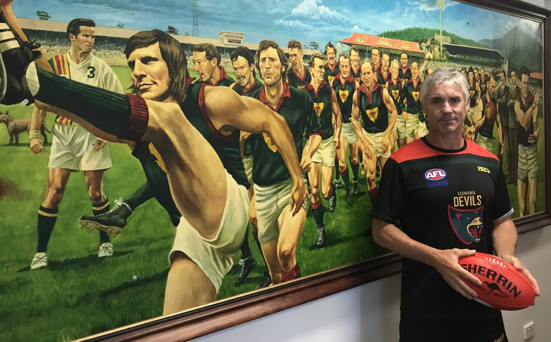 BRINGING IT HOME: Proud Tasmanian Adrian Fletcher ponders over the state's rich football history in his new position as Devils under-18 NAB League coach. Pictures: AFL Tasmania