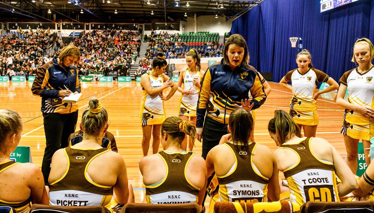 ALL EARS: Northern Hawks co-coach Ruth Tuohy delivers a critical half-time message in last year's grand final against Cavaliers. Picture: Scott Gelston