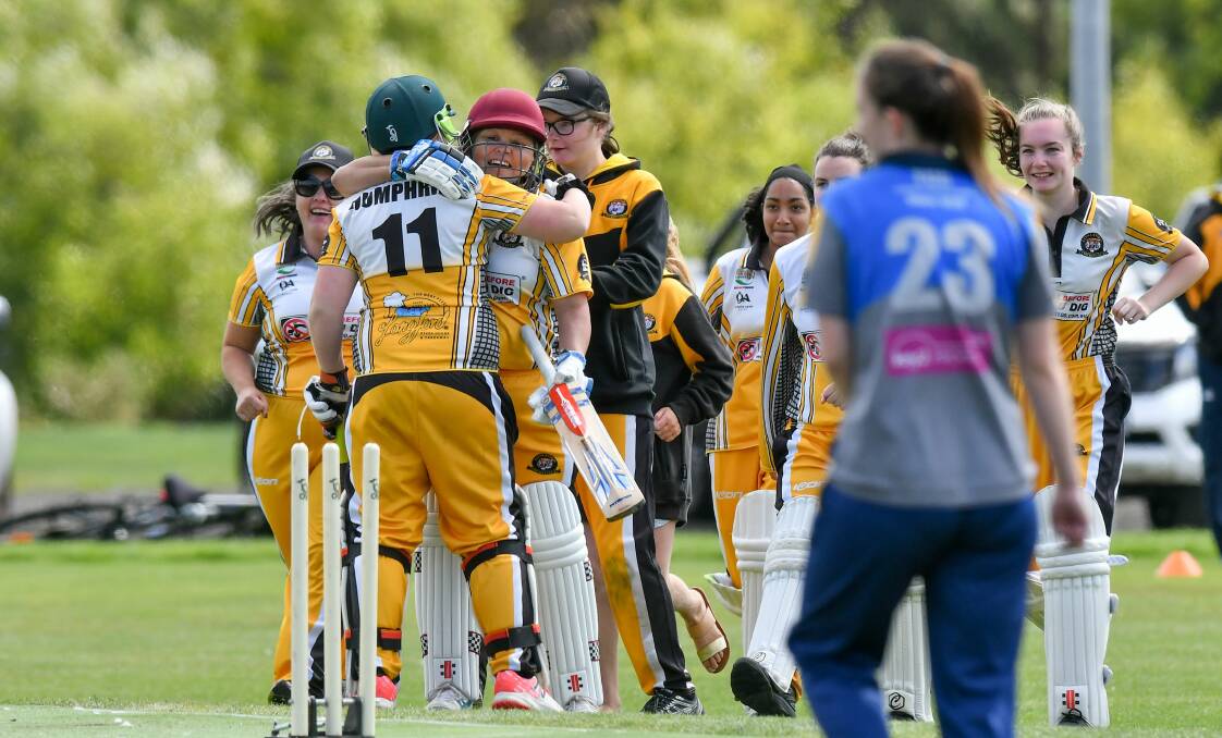 WE DID IT: Longford players congregate in the centre of University Oval to celebrate their TCL T20 Boom premiership victory. Pictures: Scott Gelston