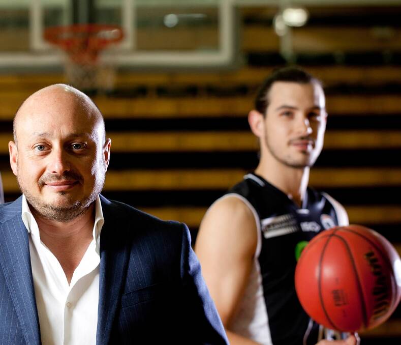 TASSIE TRIAL: NBL owner Larry Kestelman with Launceston-born Chris Goulding are keen to have the NBL blitz land in Tasmania. Picture: AAP