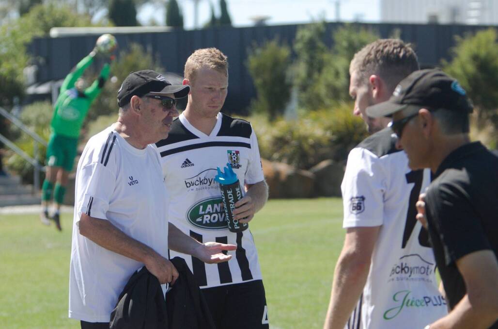 LAST HURRAH: Outgoing Launceston City coach Peter Sawdon speaks to his charges for the final time during Saturday's friendly against Hobart Zebras. Picture: Jamie Richardson