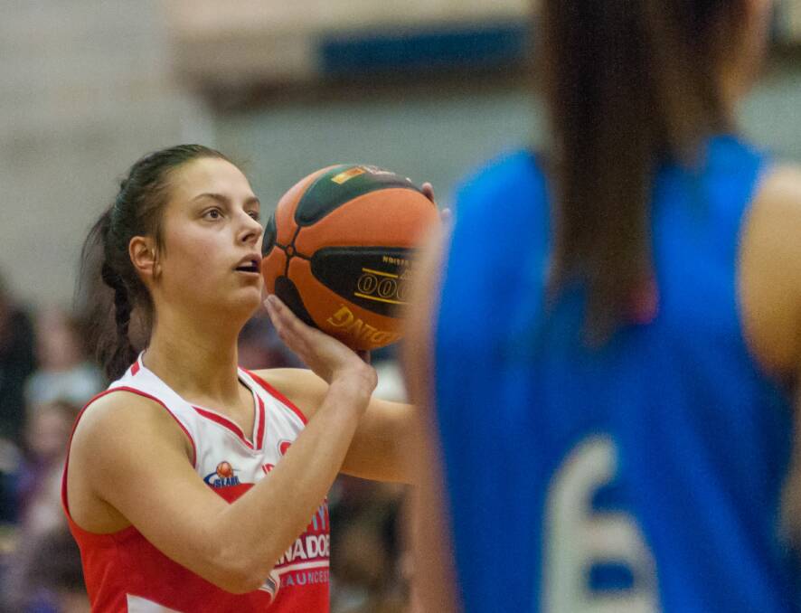 EYES ON THE PRIZE: Tornadoes forward Olivia Chugg takes her time at the free throw line against the Bandits at Elphin Sports Centre. Picture: Phillip Biggs