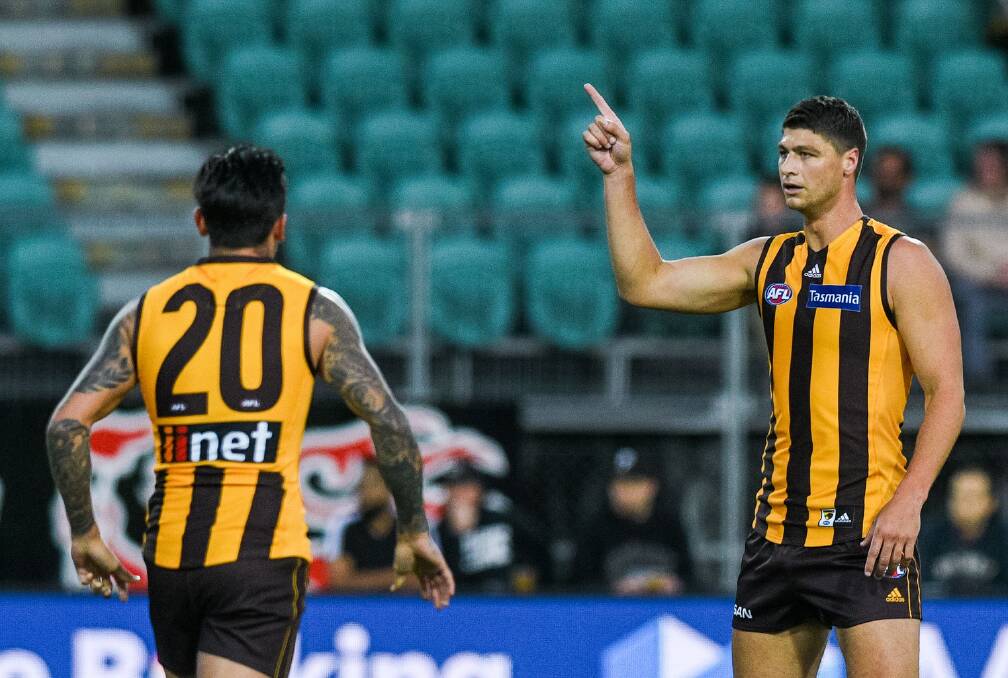 THIS WAY: Hawthorn recruit Jonathon Patton points the way to teammate Chad Wingard in the last game in Launceston during this year's preseason. Picture: Phillip Biggs