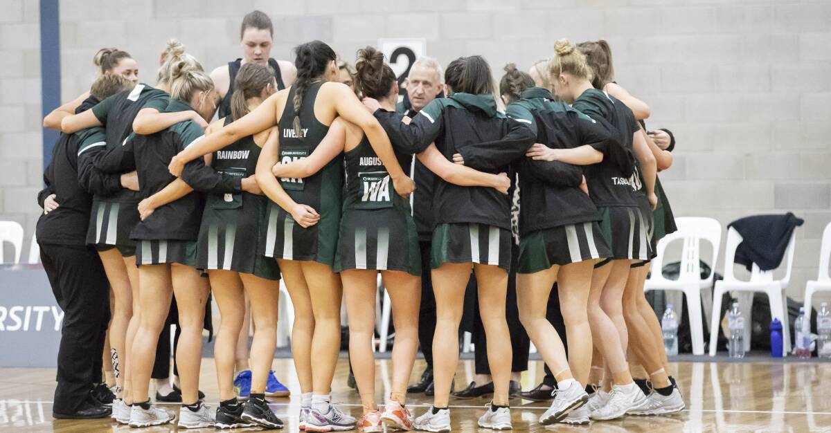 TEAM UP: Tasmanian Magpies forma  huddle after the semi-final win. Picture: Phillip Briggs