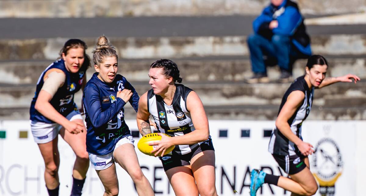 CHASE IS ON: Launceston's Makenna Hillier gives pursuit to catch Glenorchy's Alice Raspin out in the TSLW battle at KGV Oval on Saturday. Picture: Solstice Digital