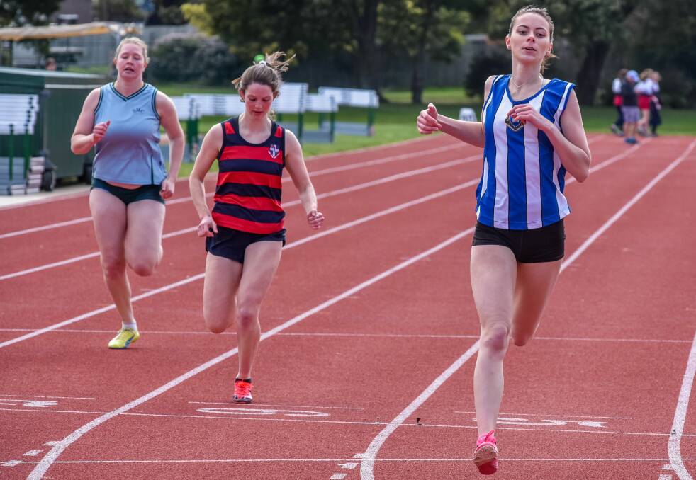 HOME AND HOSED: Georgia Arnold picks up a 100m win for Launceston Grammar.