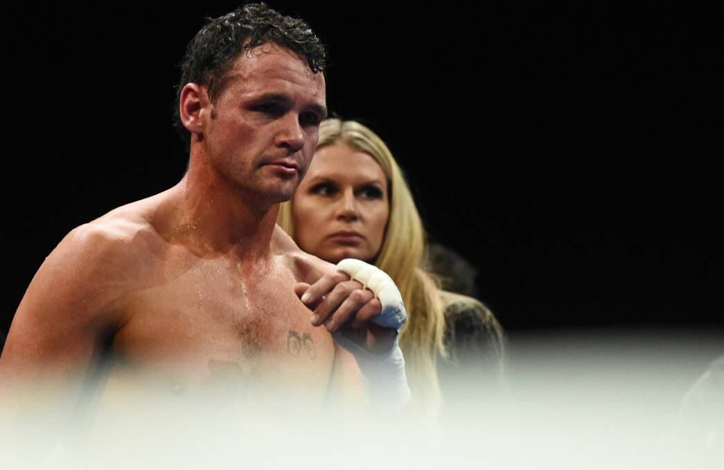 MOTIVATED: A forlorn Daniel Geale with wife Sheena after his last time in the ring at the Silverdome went awry.