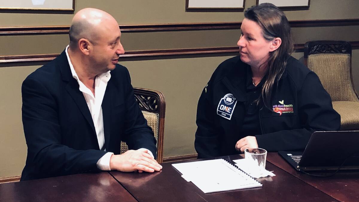 TABLE TALKS: NBL owner and executive chairman Larry Kestelman gets down to business with his Launceston NBL Tasmania adviser Janie Finlay.
