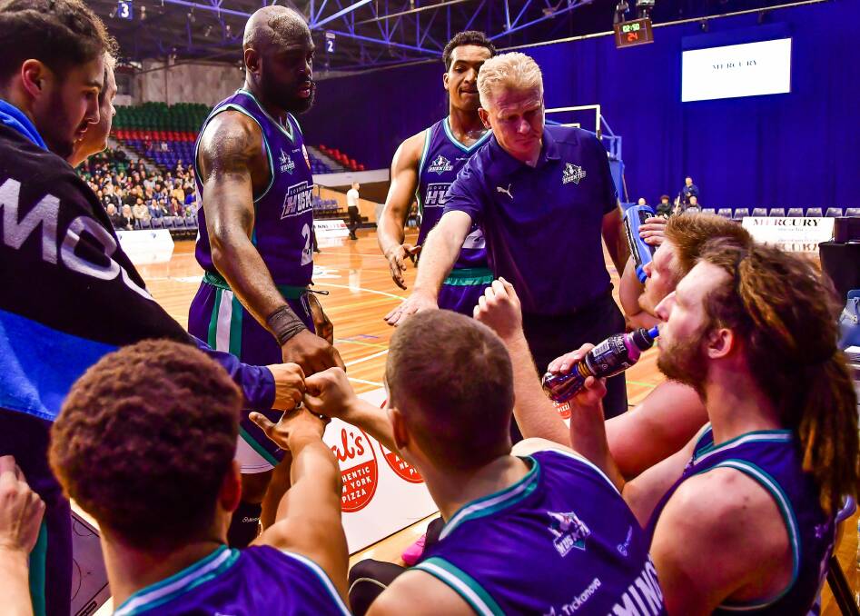 ALL IN: Former Southern Huskies assistant coach Brett Smith (centre) has been left dumbfounded by the rebirth of the old franchise in Auckland.