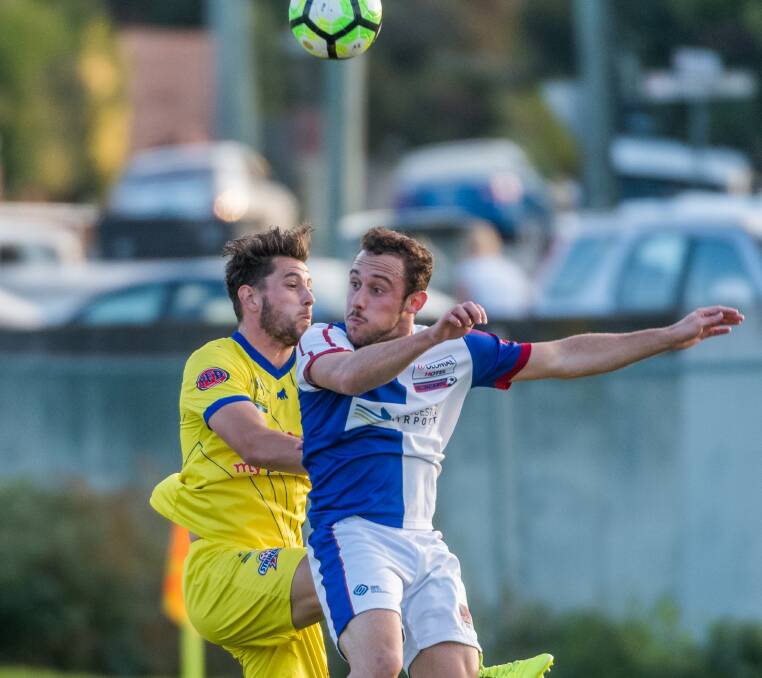 HEADS UP: Northern Rangers import Federico Cano Colaianni was in the thick of play up against Devonport City rival Joel Stone during Saturday's clash. Picture: Phillip Biggs
