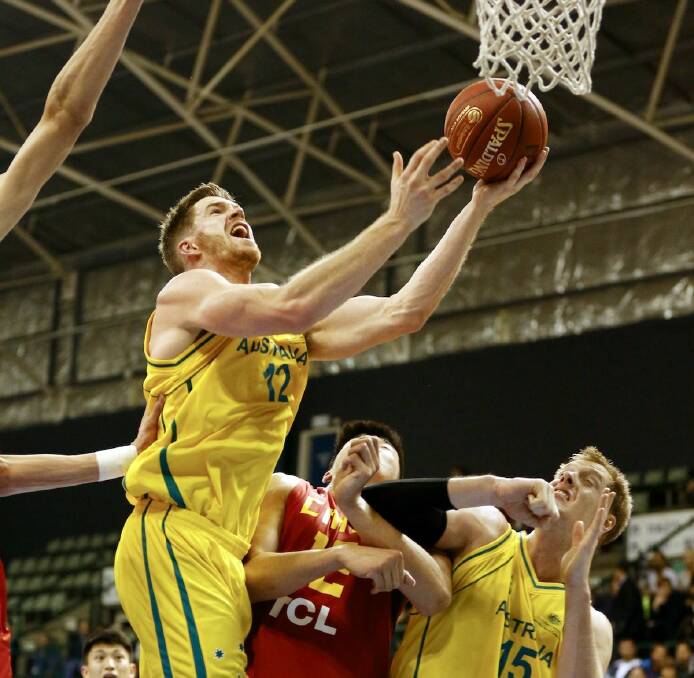 FERVOUR: The Boomers debutant takes on China. Picture: Tomasz Gregorczyk