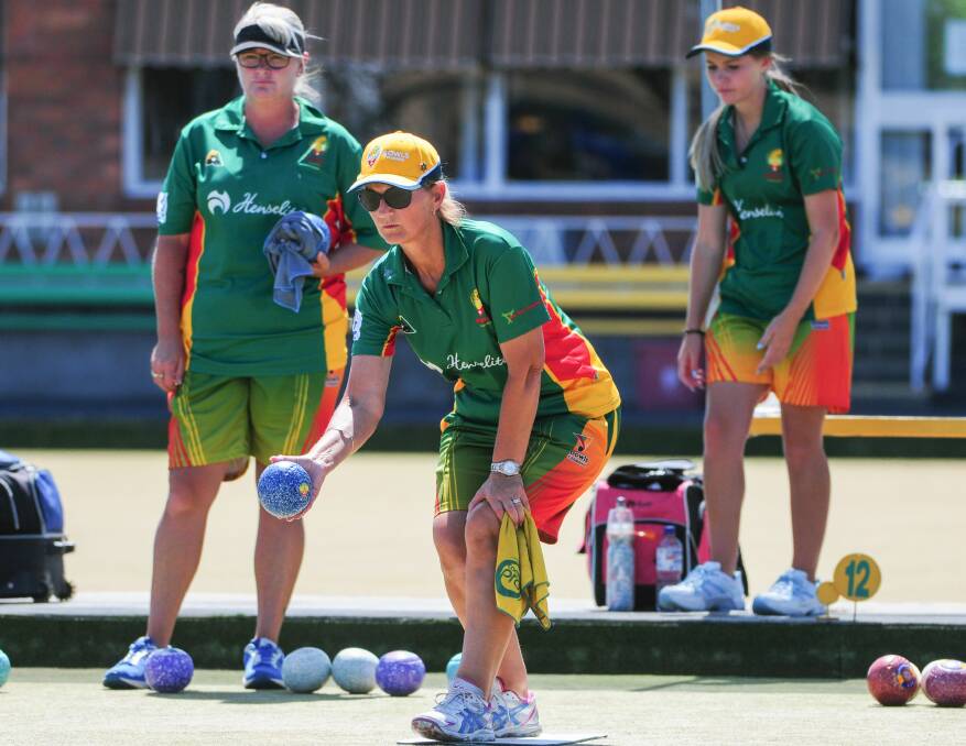 GOT YOUR BACK: Tasmanian Maureen Zoon is watched by her teammates Bronny King and Lauren Banks in the rink's winning Test series against the ACT at North Launceston Bowls Club. Pictures: Paul Scambler 