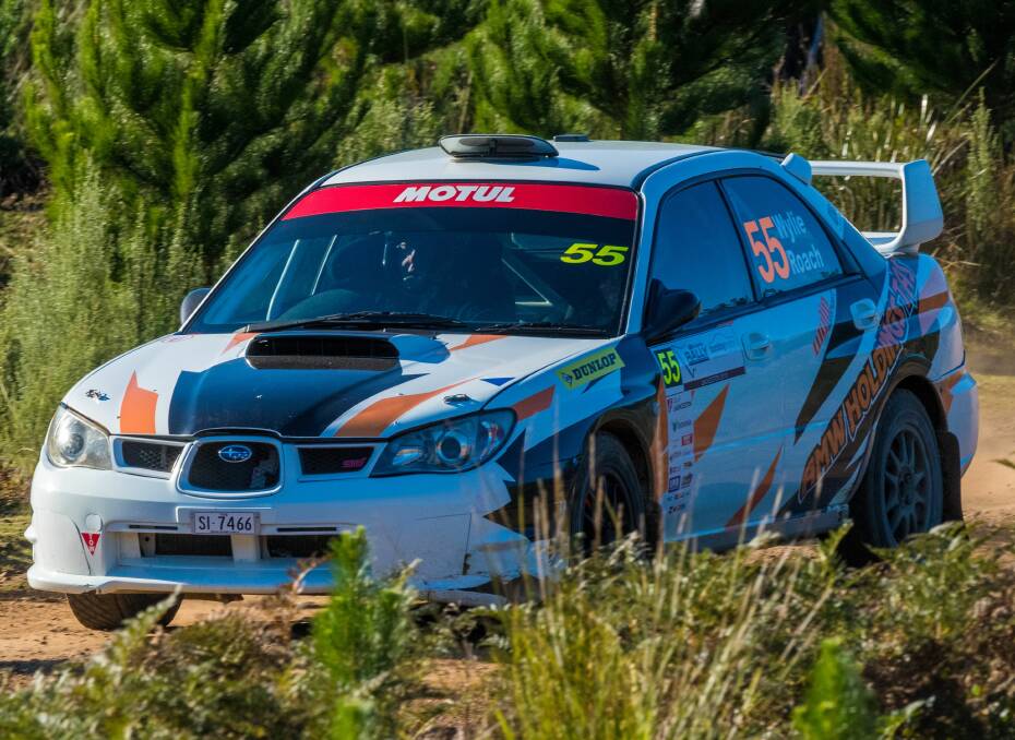 BUSH BASH: Devonport driver Kurt Wylie battles his way through the scrub in a very heated contest for Tasmanian rally supremacy on Sunday with stage leader Tim Auty. Picture: Phillip Biggs