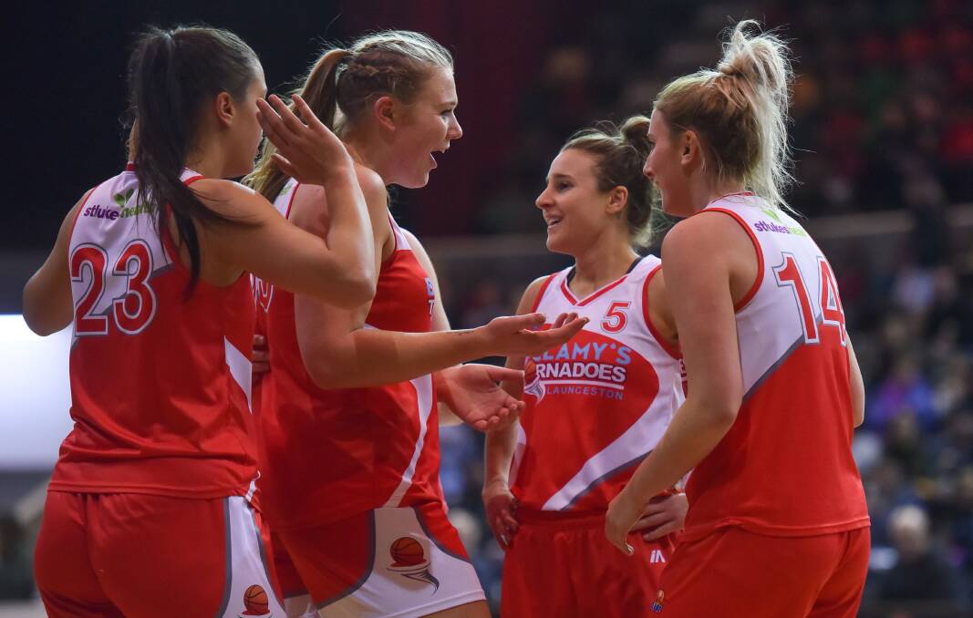 HOW GOOD IS THAT: Tayla Roberts shows her joy with Tornadoes teammates in the midst of a thrilling road semi-final win against the Chargers. Pictures: Scott Gelston