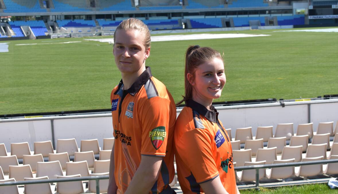 WE'RE BACK: Greater Northern Raiders pair James Beattie and Dana Lester show off their colours at Bellerive Oval on Thursday. Picture: Cricket Tasmania