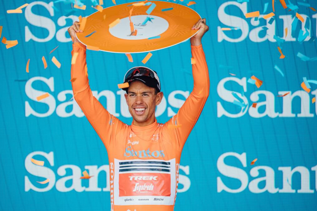 MY WIN: A jubilant Richie Porte holds up the Tour Down Under prize. Pictures: Supplied