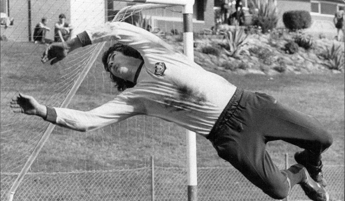 NO DIVER: Reilly practices his goal-saving leap at one of the Socceroos' last training sessions in Sydney ahead of departing for the 1974 World Cup. Picture: Fairfax Media