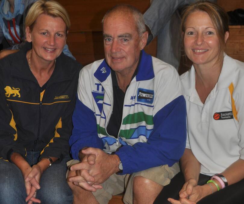 CATCH UP: Liz Dixon and Peter Robertson join Veale to watch a Launceston Tornadoes home game in 2013.
