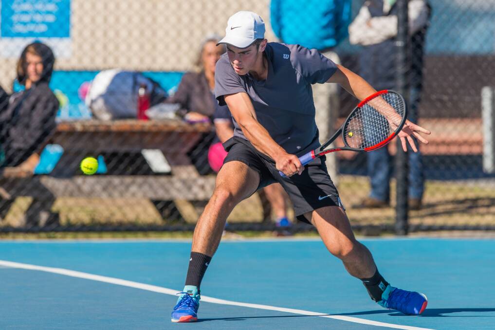 DETERMINED: Ben Barnett looks to execute a slicing backhand in the Pardey Shield boys final. Picture: Phillip Biggs.