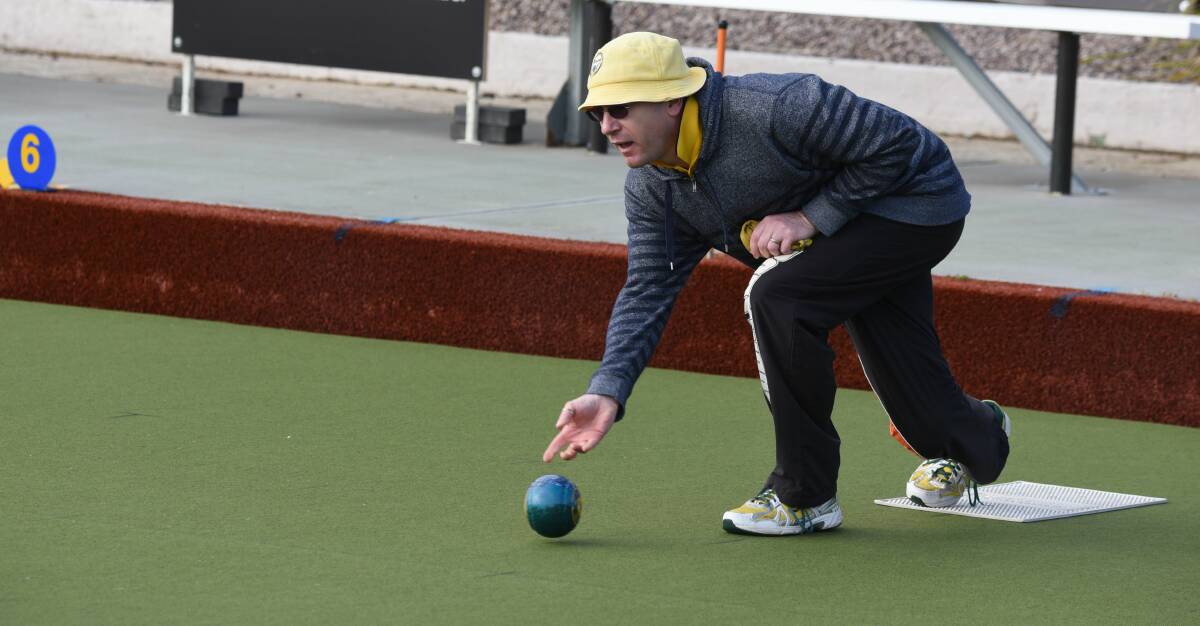 DAPPER: Mark Nitz, of Burnie, shows off his irrepressible style on the greens at the East Launceston Bowls club on Saturday.