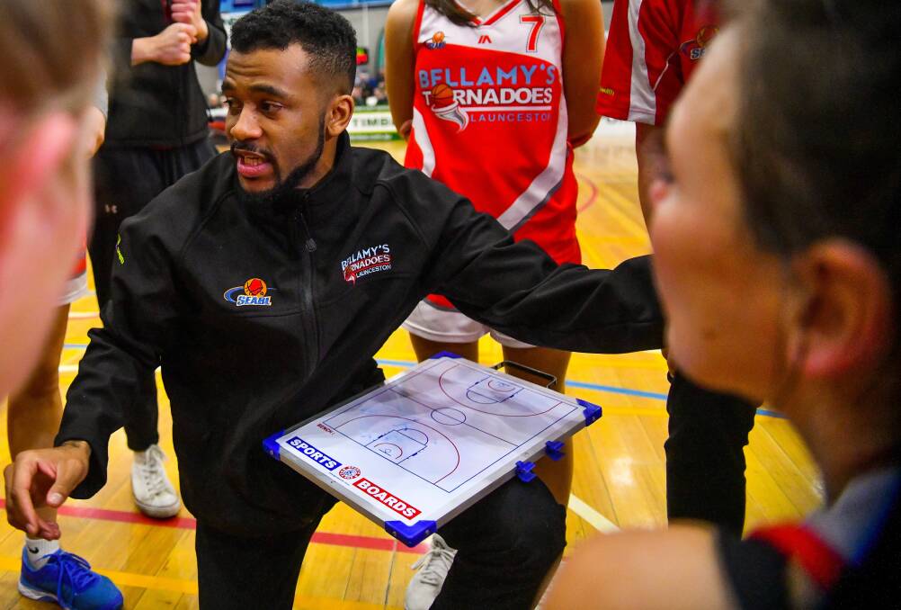 TAKING CHARGE: Launceston Tornadoes coach Derrick Washington looks for answers off the bench.