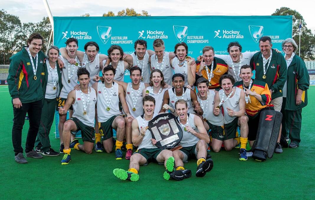 WE ARE THE CHAMPIONS: Tasmania shares a special moment during the presentations of their gold-medal win from the Australian under-21 hockey final on Wednesday against Victoria in Sydney. Picture: Click in Focus