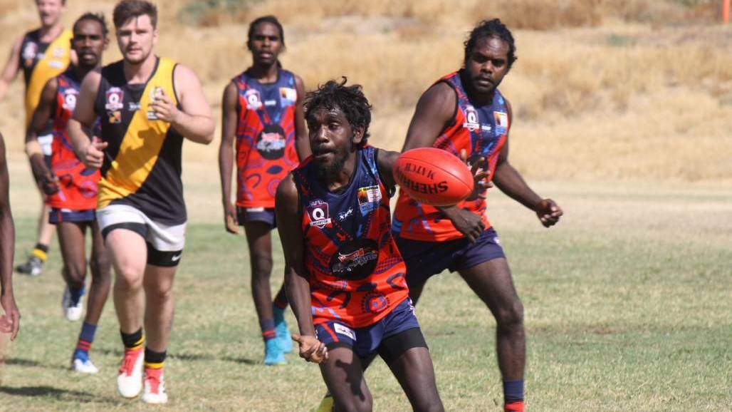 Lake Nash Young Guns in action against the Mount Isa Tigers.