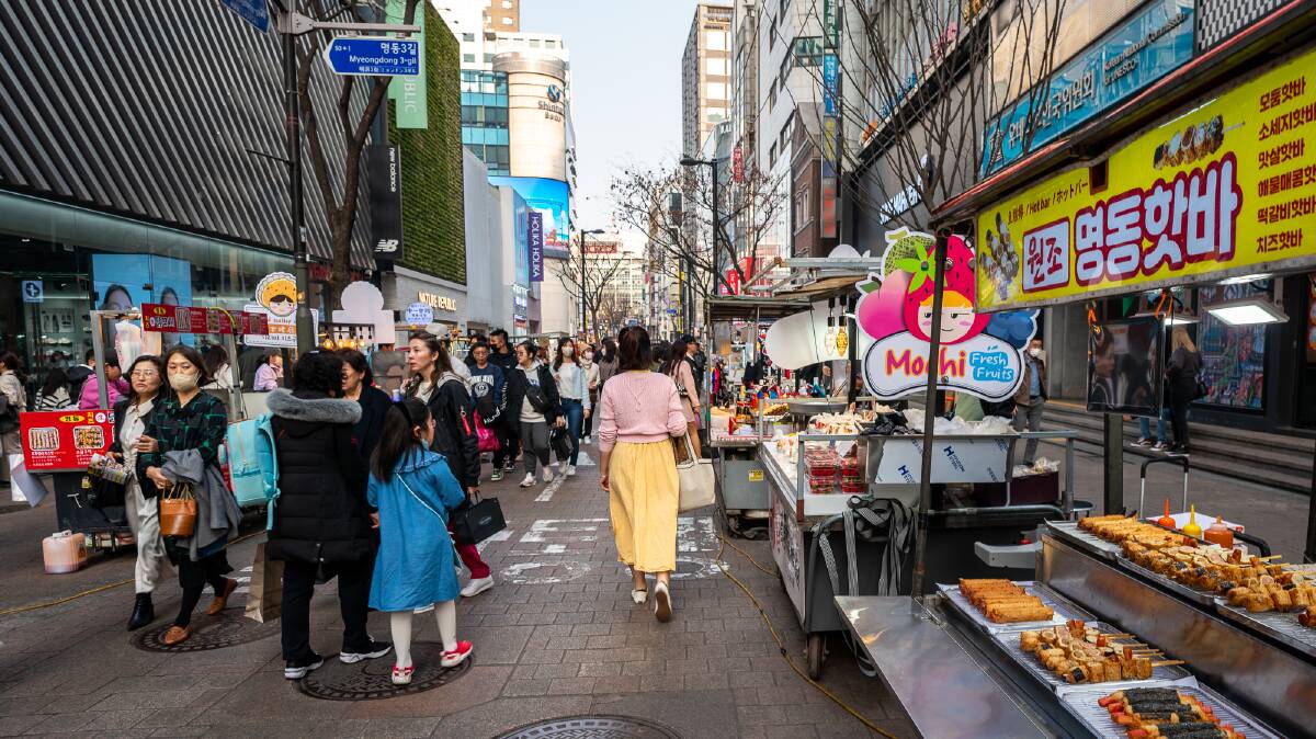 The busy street market in the neighbourhood of Myeongdong.