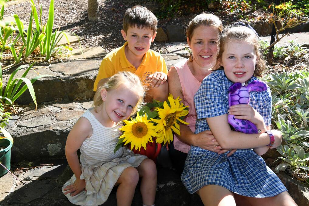 TREVALLYN FAMILY: Harriet, 4, Max, 9, Georgie and Sophie Schilg, 11 mark the start of Epilepsy Awareness Month. Picture: Neil Richardson