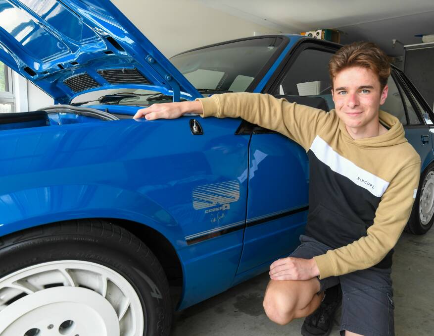 RARE CAR: Holden fan Brock Cameron with his dad's 1985 HDT VK Group A SS Brock Commodore. Picture: Neil Richardson