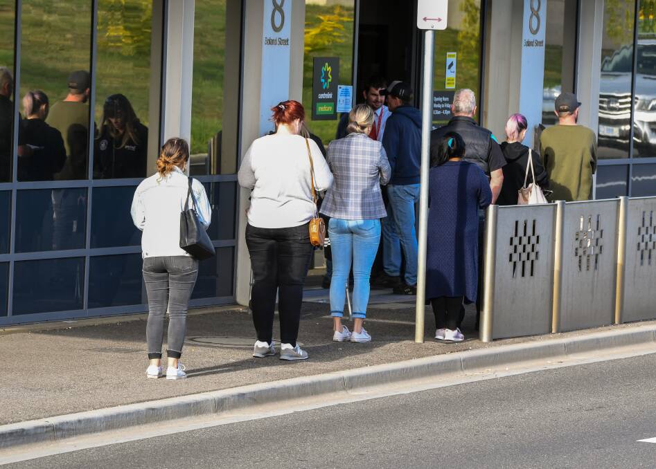 CENTRELINK LINE: People seeking federal government support in Launceston after businesses were forced to shut their doors because of the coronavirus pandemic. 
