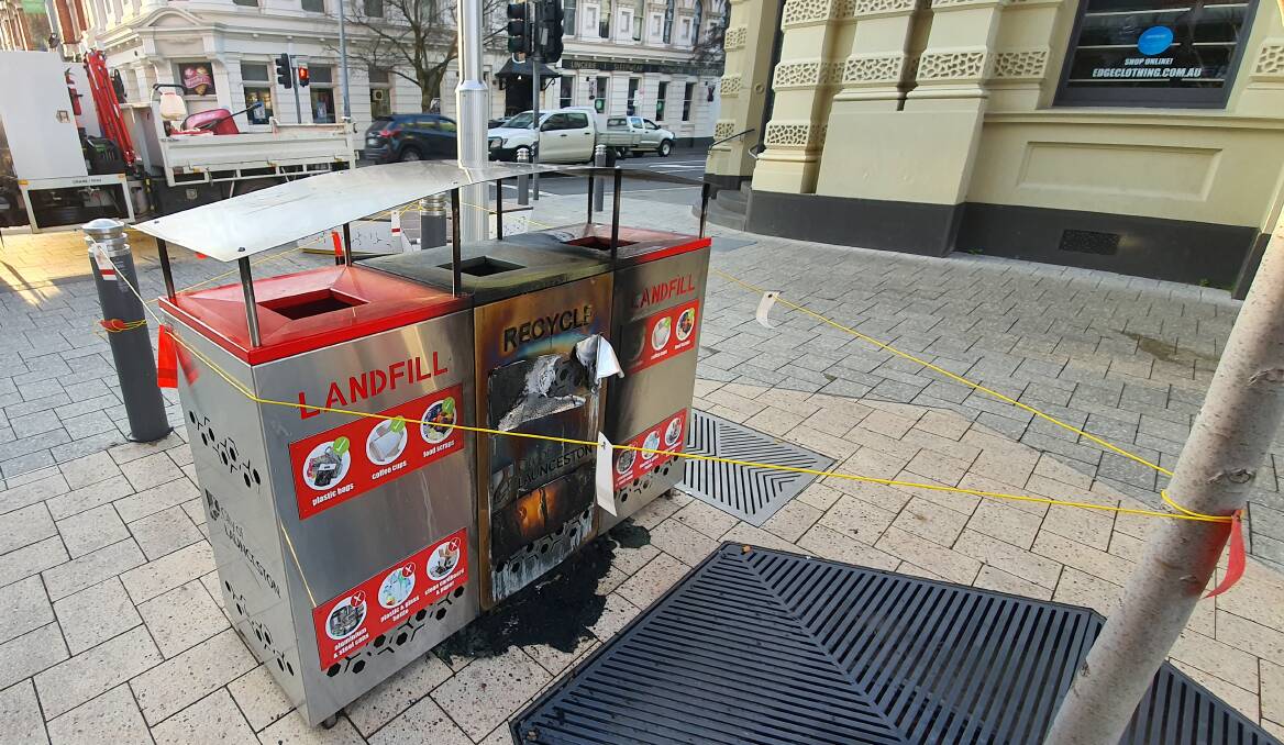 BADLY BURNT: Three bins near Myer were set on fire on Saturday morning. Picture: Robin Smith