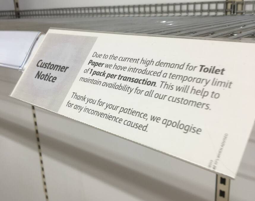 RARE RULE: Supermarket shoppers have been banned from buying excessive amounts of toilet paper. Picture: Ryan Young.