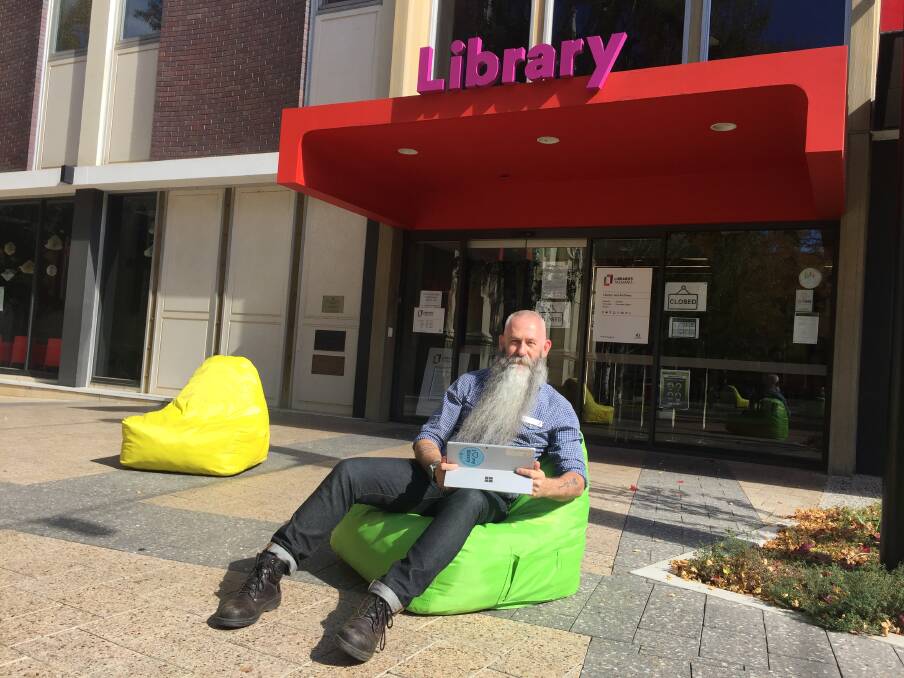 ENSURING ACCESS: Launceston Library manager Garry Conroy-Cooper is passionate about ensuring everyone knows they can access their public library online during the COVID-19 pandemic. Picture: Ryan Young