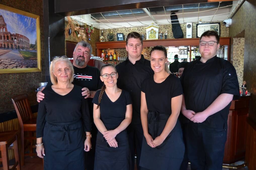 MORE JOBS: Ollie and Rob Macedon with the local staff employed to help run Don Mario's. Picture: Ryan Young.