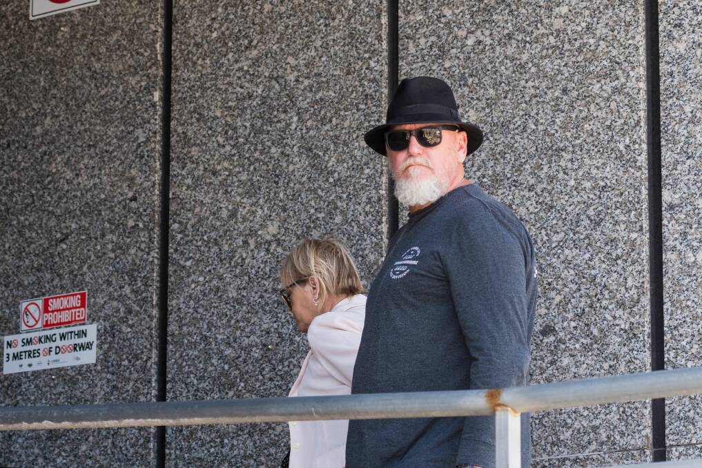 JUDGEMENT DAY7: Kim Fayers (left) enters court with a male supporter. Picture: Phil Biggs