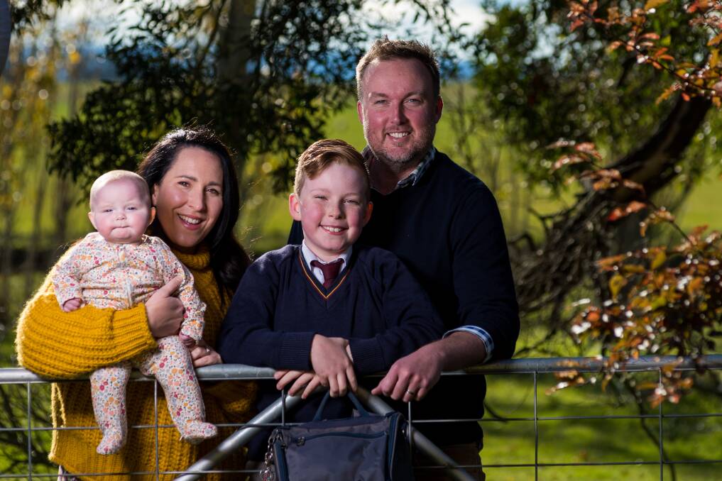 JUGGLING ACT: Beatrix, Zoe, Gus and Jason Howard are ready for a return to the classroom and their family's small business. Picture: Phillip Biggs.