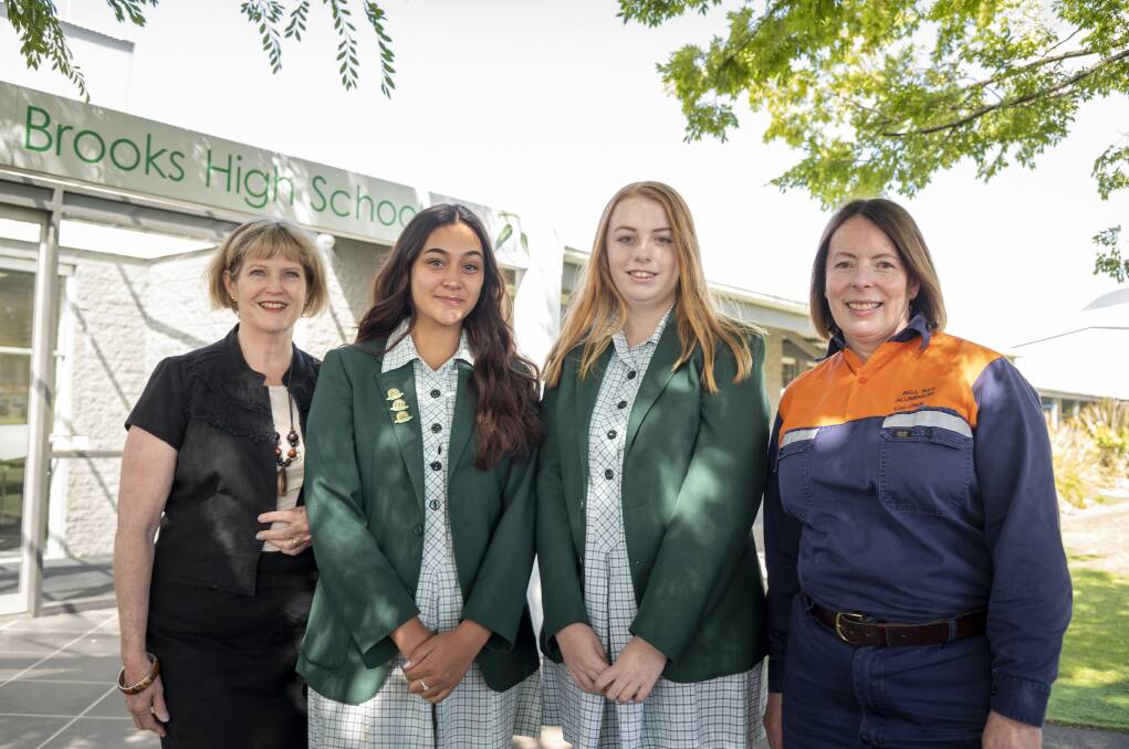 ENABLING WOMEN: Rotary Club of Tamar Sunrise member Barb Donaldson, Brooks High students Rosella Pike and Indya Young with Bell Bay Aluminium representative Lou Clark. Picture: Rob Burnett.
