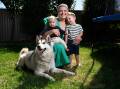 Caitlin Walker with dog Nala and kids Aston and Oakley. Picture by Adam Trafford