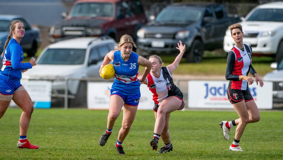 BAG OF GOALS: South Launceston's Aprille Crooks pictured playing against George Town this year. She kicked five majors on Saturday in her team's victory against Longford. Picture: Paul Scambler